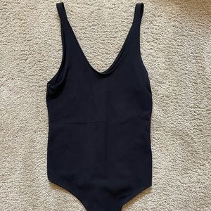 Abercrombie black ruched v neck bodysuit. Never been worn, size M